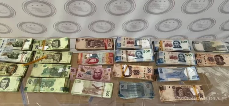 Nuevo León captura a dos hombres con más de medio millón de pesos oculto en tractocamión